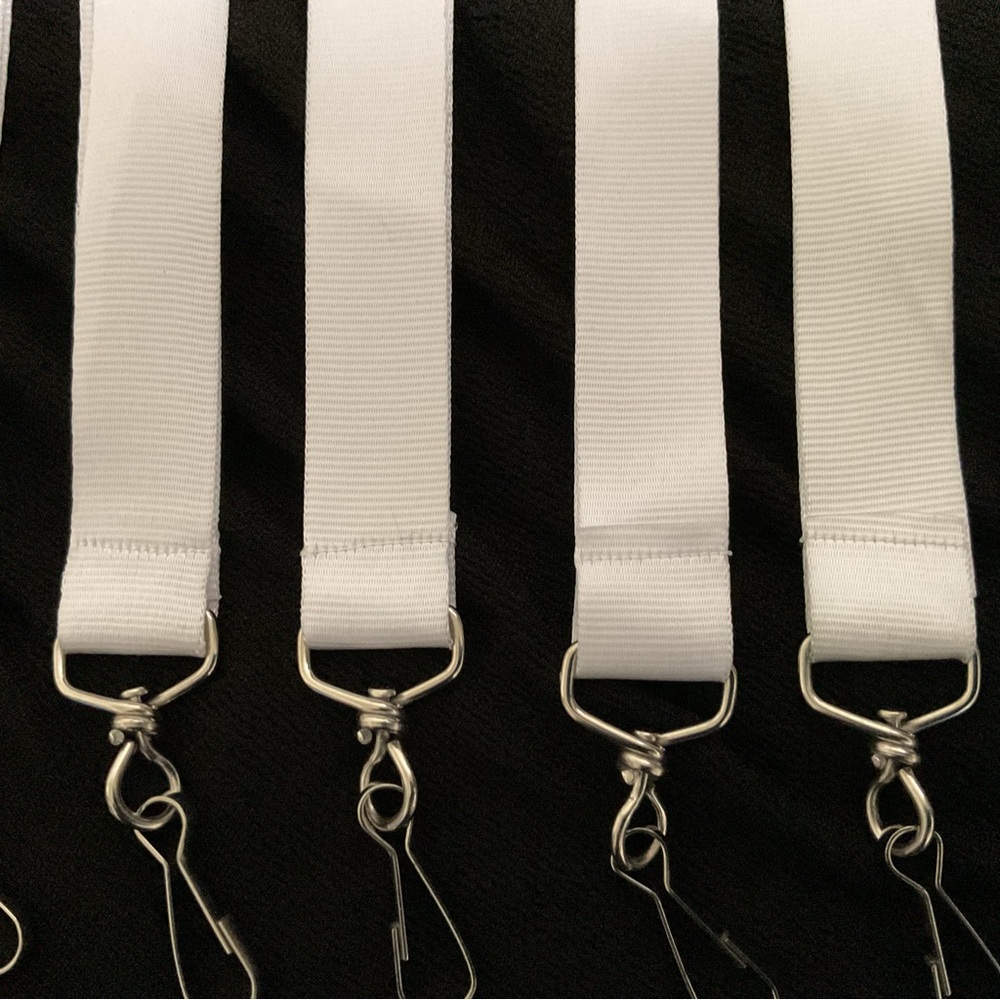 Sold in sets of (10) @ $10ea. or $99./140 White Lanyards/Clips for badges/keys